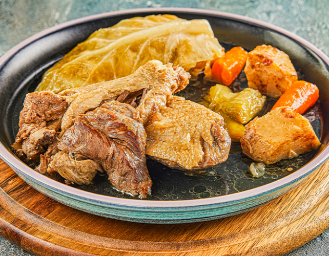 Pot-au-feu de confit de canard, plat traditionnel revisité